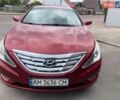 Червоний Хендай Соната, об'ємом двигуна 2.4 л та пробігом 247 тис. км за 7500 $, фото 1 на Automoto.ua