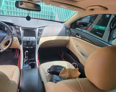 Красный Хендай Соната, объемом двигателя 2.36 л и пробегом 285 тыс. км за 10500 $, фото 1 на Automoto.ua