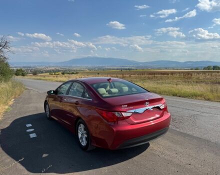 Красный Хендай Соната, объемом двигателя 2.4 л и пробегом 104 тыс. км за 9000 $, фото 1 на Automoto.ua