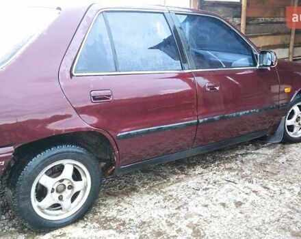 Красный Хендай Соната, объемом двигателя 2 л и пробегом 359 тыс. км за 1300 $, фото 1 на Automoto.ua