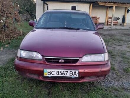 Хендай Соната 1995 у Рава-Руська на Automoto.ua Червоний Хендай Соната, об'ємом двигуна 2 л та пробігом 206 тис. км за 1000 $, фото 1 на Automoto.ua