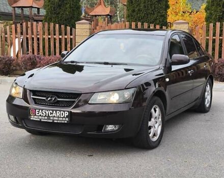 Красный Хендай Соната, объемом двигателя 2.36 л и пробегом 300 тыс. км за 3899 $, фото 1 на Automoto.ua