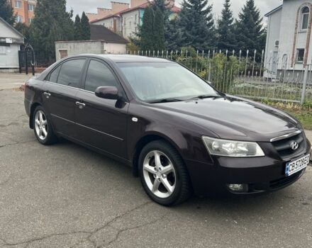 Красный Хендай Соната, объемом двигателя 2.4 л и пробегом 252 тыс. км за 5800 $, фото 1 на Automoto.ua