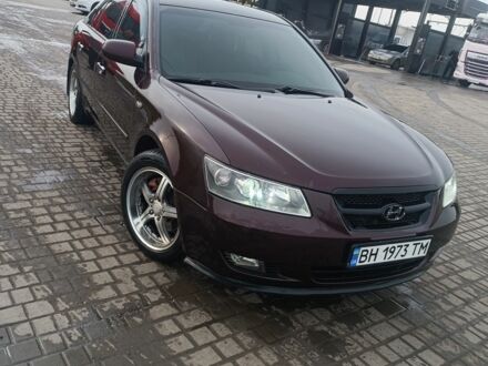 Красный Хендай Соната, объемом двигателя 2.4 л и пробегом 302 тыс. км за 6000 $, фото 1 на Automoto.ua