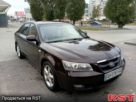 Красный Хендай Соната, объемом двигателя 2.4 л и пробегом 253 тыс. км за 5800 $, фото 1 на Automoto.ua