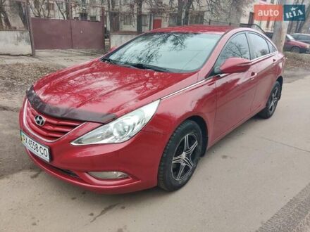 Червоний Хендай Соната, об'ємом двигуна 2 л та пробігом 206 тис. км за 8500 $, фото 1 на Automoto.ua