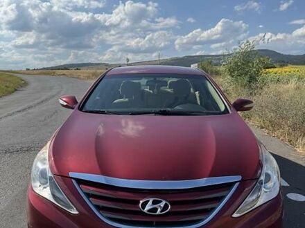 Красный Хендай Соната, объемом двигателя 2.4 л и пробегом 104 тыс. км за 9600 $, фото 1 на Automoto.ua