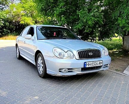 Серый Хендай Соната, объемом двигателя 2 л и пробегом 200 тыс. км за 3000 $, фото 2 на Automoto.ua