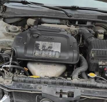 Серый Хендай Соната, объемом двигателя 2 л и пробегом 260 тыс. км за 3250 $, фото 11 на Automoto.ua