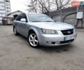 Серый Хендай Соната, объемом двигателя 2.4 л и пробегом 235 тыс. км за 5750 $, фото 1 на Automoto.ua