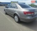Серый Хендай Соната, объемом двигателя 2.36 л и пробегом 186 тыс. км за 5400 $, фото 7 на Automoto.ua