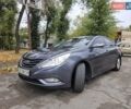 Серый Хендай Соната, объемом двигателя 2 л и пробегом 247 тыс. км за 9000 $, фото 1 на Automoto.ua