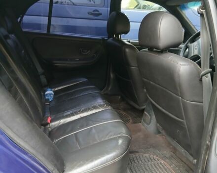 Синий Хендай Соната, объемом двигателя 3 л и пробегом 200 тыс. км за 1000 $, фото 6 на Automoto.ua