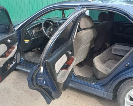 Синий Хендай Соната, объемом двигателя 2.7 л и пробегом 242 тыс. км за 3399 $, фото 7 на Automoto.ua