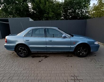 Синий Хендай Соната, объемом двигателя 2 л и пробегом 130 тыс. км за 2500 $, фото 1 на Automoto.ua