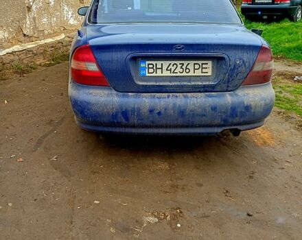Синий Хендай Соната, объемом двигателя 2 л и пробегом 100 тыс. км за 1500 $, фото 1 на Automoto.ua