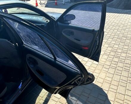 Синий Хендай Соната, объемом двигателя 2 л и пробегом 321 тыс. км за 1650 $, фото 7 на Automoto.ua