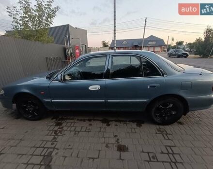 Синий Хендай Соната, объемом двигателя 2 л и пробегом 127 тыс. км за 2200 $, фото 8 на Automoto.ua