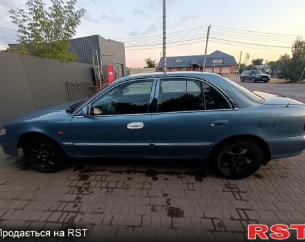 Синий Хендай Соната, объемом двигателя 2 л и пробегом 130 тыс. км за 2500 $, фото 3 на Automoto.ua