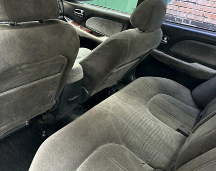 Синий Хендай Соната, объемом двигателя 2.7 л и пробегом 176 тыс. км за 3500 $, фото 11 на Automoto.ua