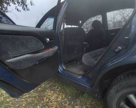 Синий Хендай Соната, объемом двигателя 2 л и пробегом 144 тыс. км за 2200 $, фото 7 на Automoto.ua