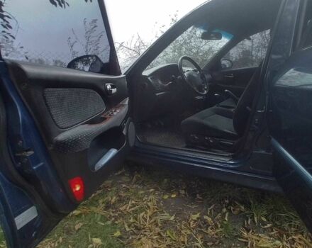 Синий Хендай Соната, объемом двигателя 2 л и пробегом 144 тыс. км за 2200 $, фото 3 на Automoto.ua