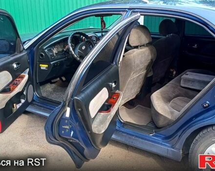Синий Хендай Соната, объемом двигателя 2.7 л и пробегом 242 тыс. км за 3380 $, фото 3 на Automoto.ua