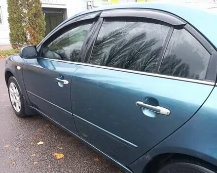 Синий Хендай Соната, объемом двигателя 2.36 л и пробегом 357 тыс. км за 4400 $, фото 9 на Automoto.ua