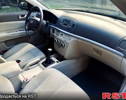 Синий Хендай Соната, объемом двигателя 2.4 л и пробегом 240 тыс. км за 3500 $, фото 4 на Automoto.ua