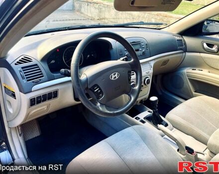 Синий Хендай Соната, объемом двигателя 2.4 л и пробегом 240 тыс. км за 3500 $, фото 3 на Automoto.ua