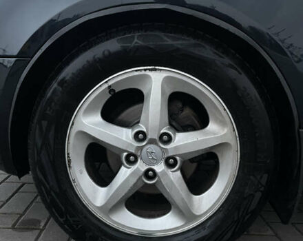 Синій Хендай Соната, об'ємом двигуна 2.4 л та пробігом 226 тис. км за 7200 $, фото 11 на Automoto.ua