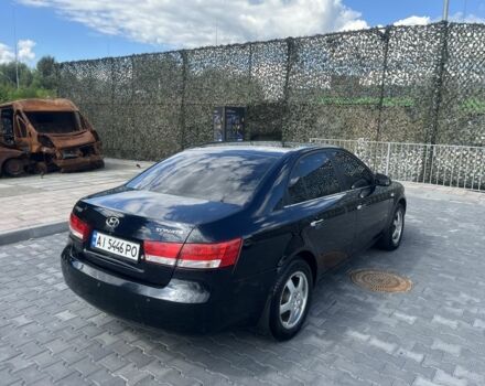 Синий Хендай Соната, объемом двигателя 2.4 л и пробегом 340 тыс. км за 6000 $, фото 5 на Automoto.ua