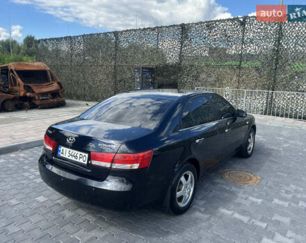 Синий Хендай Соната, объемом двигателя 2.36 л и пробегом 345 тыс. км за 5999 $, фото 4 на Automoto.ua