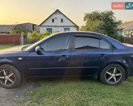 Синий Хендай Соната, объемом двигателя 2 л и пробегом 340 тыс. км за 5800 $, фото 5 на Automoto.ua