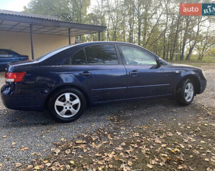 Синий Хендай Соната, объемом двигателя 2 л и пробегом 264 тыс. км за 5799 $, фото 3 на Automoto.ua