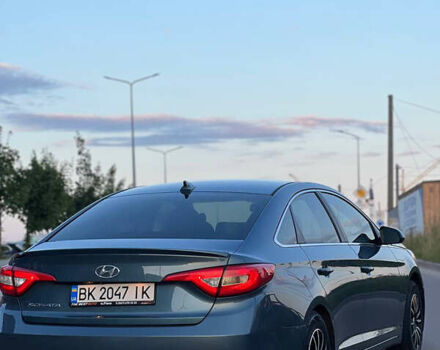 Синий Хендай Соната, объемом двигателя 2.4 л и пробегом 205 тыс. км за 12500 $, фото 2 на Automoto.ua