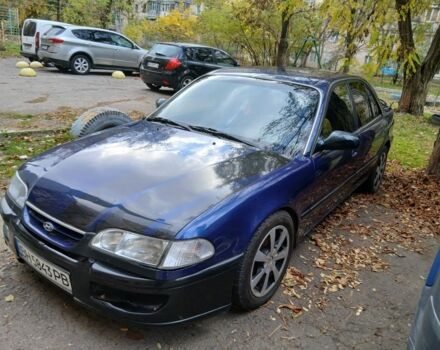 Синий Хендай Соната, объемом двигателя 3 л и пробегом 200 тыс. км за 1000 $, фото 1 на Automoto.ua