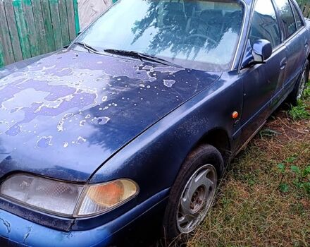 Синий Хендай Соната, объемом двигателя 2 л и пробегом 320 тыс. км за 470 $, фото 1 на Automoto.ua