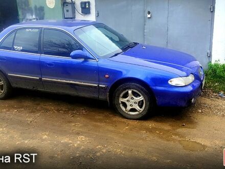 Синий Хендай Соната, объемом двигателя 2 л и пробегом 216 тыс. км за 2000 $, фото 1 на Automoto.ua