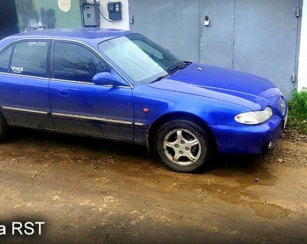 Синий Хендай Соната, объемом двигателя 2 л и пробегом 216 тыс. км за 2000 $, фото 1 на Automoto.ua
