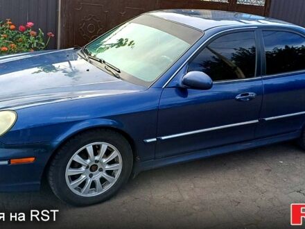 Синий Хендай Соната, объемом двигателя 2.7 л и пробегом 242 тыс. км за 3380 $, фото 1 на Automoto.ua