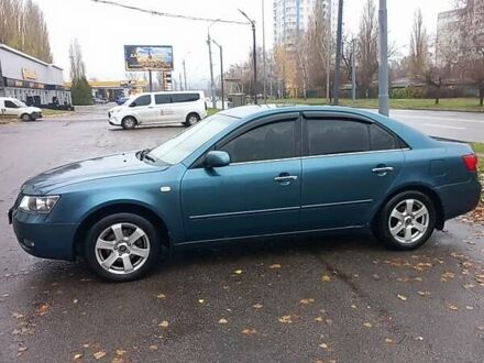 Синий Хендай Соната, объемом двигателя 2.36 л и пробегом 357 тыс. км за 4400 $, фото 1 на Automoto.ua