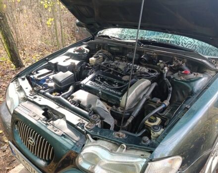 Зеленый Хендай Соната, объемом двигателя 2 л и пробегом 311 тыс. км за 1903 $, фото 7 на Automoto.ua