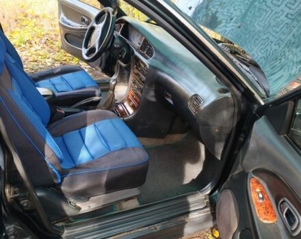 Зеленый Хендай Соната, объемом двигателя 2 л и пробегом 311 тыс. км за 1903 $, фото 6 на Automoto.ua