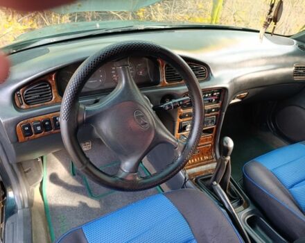 Зеленый Хендай Соната, объемом двигателя 2 л и пробегом 311 тыс. км за 1903 $, фото 3 на Automoto.ua