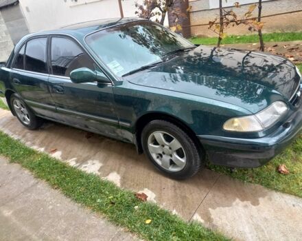 Зеленый Хендай Соната, объемом двигателя 2 л и пробегом 308 тыс. км за 1800 $, фото 10 на Automoto.ua