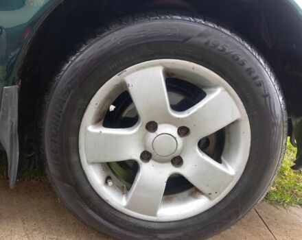 Зеленый Хендай Соната, объемом двигателя 2 л и пробегом 308 тыс. км за 1800 $, фото 9 на Automoto.ua