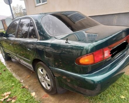 Зеленый Хендай Соната, объемом двигателя 2 л и пробегом 308 тыс. км за 1800 $, фото 3 на Automoto.ua