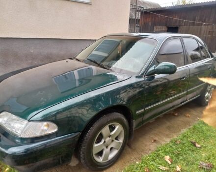 Зеленый Хендай Соната, объемом двигателя 2 л и пробегом 308 тыс. км за 1800 $, фото 4 на Automoto.ua