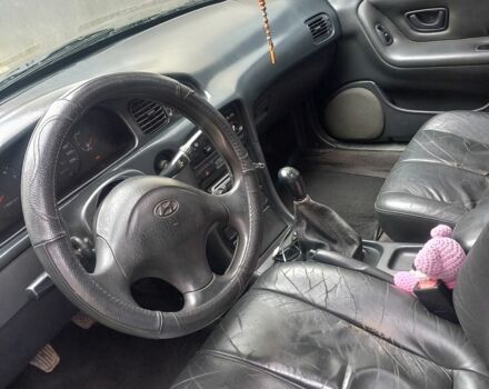 Зеленый Хендай Соната, объемом двигателя 2 л и пробегом 308 тыс. км за 1800 $, фото 8 на Automoto.ua